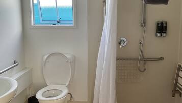 Shower, hair dryer, towels