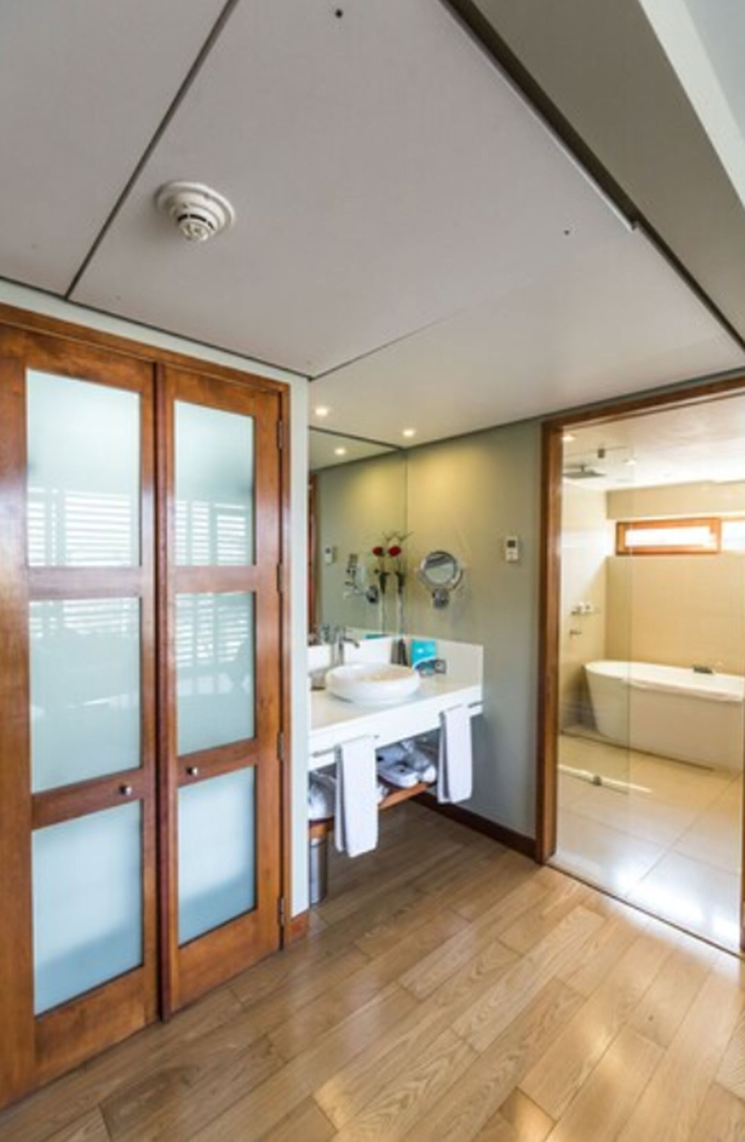 separate bathtub and shower, deep-soaking bathtub, rainfall showerhead