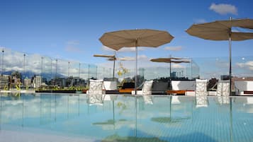 Indoor pool, outdoor pool, open 11 AM to 6 PM, pool loungers