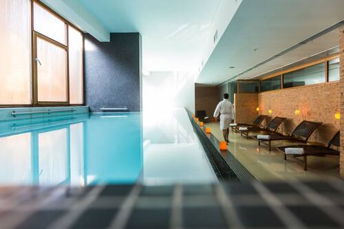 Indoor pool, outdoor pool, open 11 AM to 6 PM, pool loungers