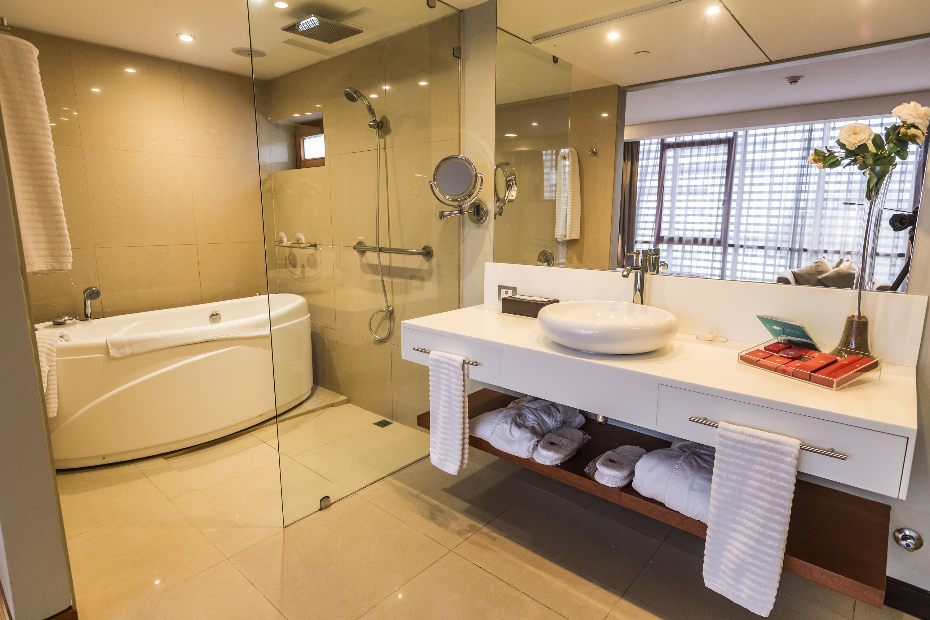 separate bathtub and shower, deep-soaking bathtub, rainfall showerhead