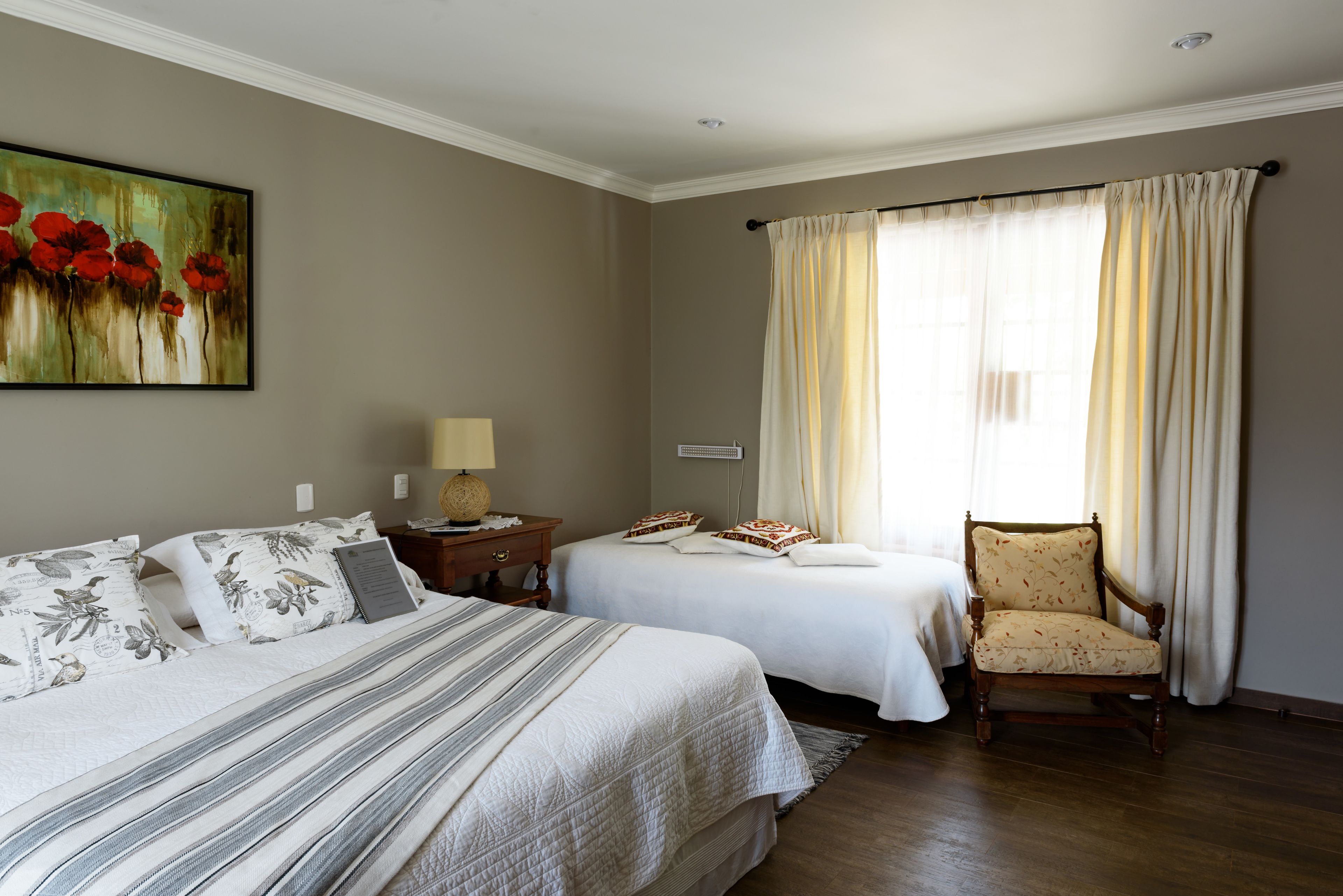 deluxe suite, 1 king bed, pool view | pillow-top beds, minibar, in-room safe, individually decorated