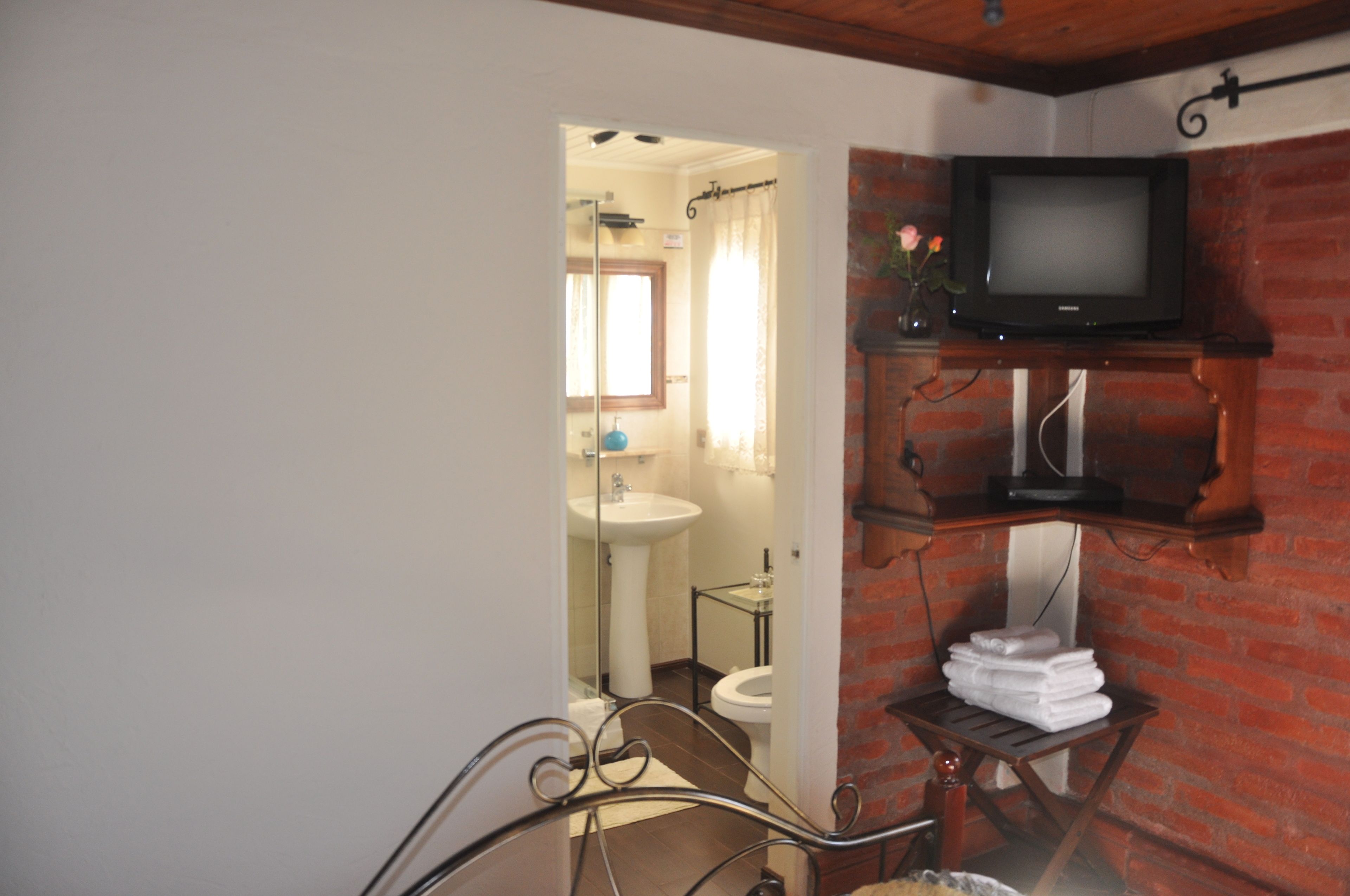 standard double room | bathroom | hair dryer, towels, shampoo, toilet paper
