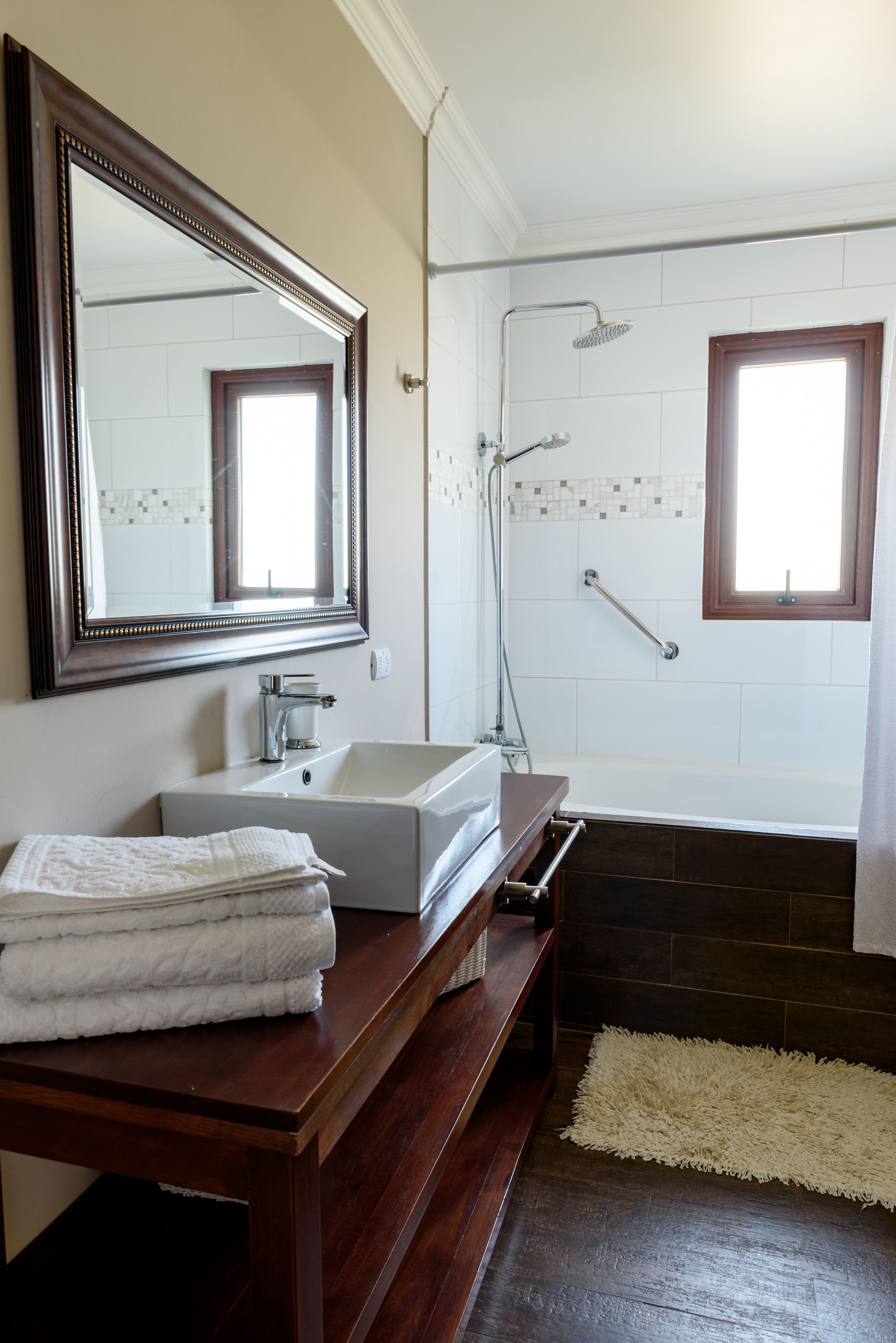 hair dryer, towels, shampoo, toilet paper