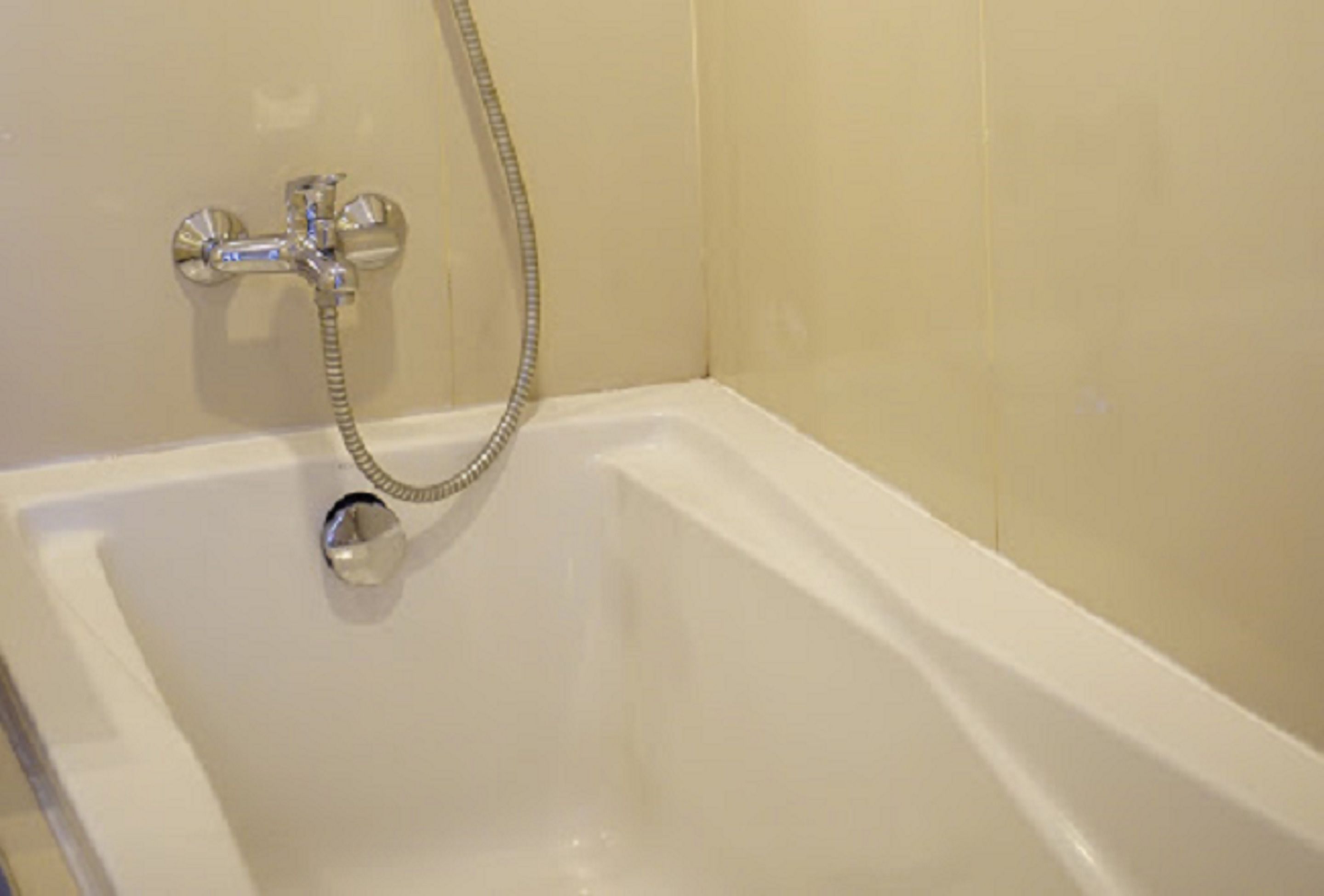 family suite | bathroom | free toiletries, hair dryer, slippers, towels