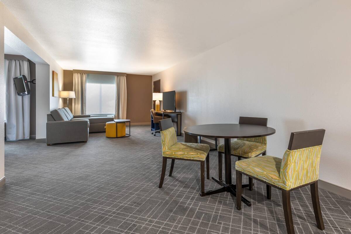 suite, 1 king bed, non smoking | in-room safe, desk, laptop workspace, iron/ironing board