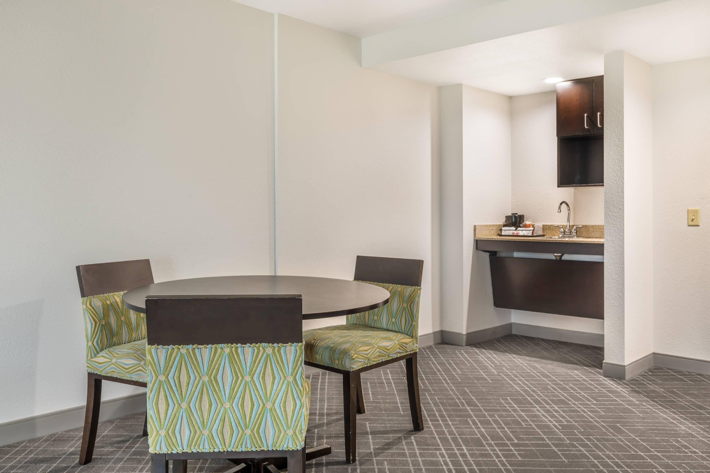 suite, 1 king bed, non smoking | in-room safe, desk, laptop workspace, iron/ironing board