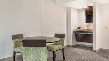 Suite, 1 King Bed, Non Smoking | In-room safe, desk, laptop workspace, iron/ironing board