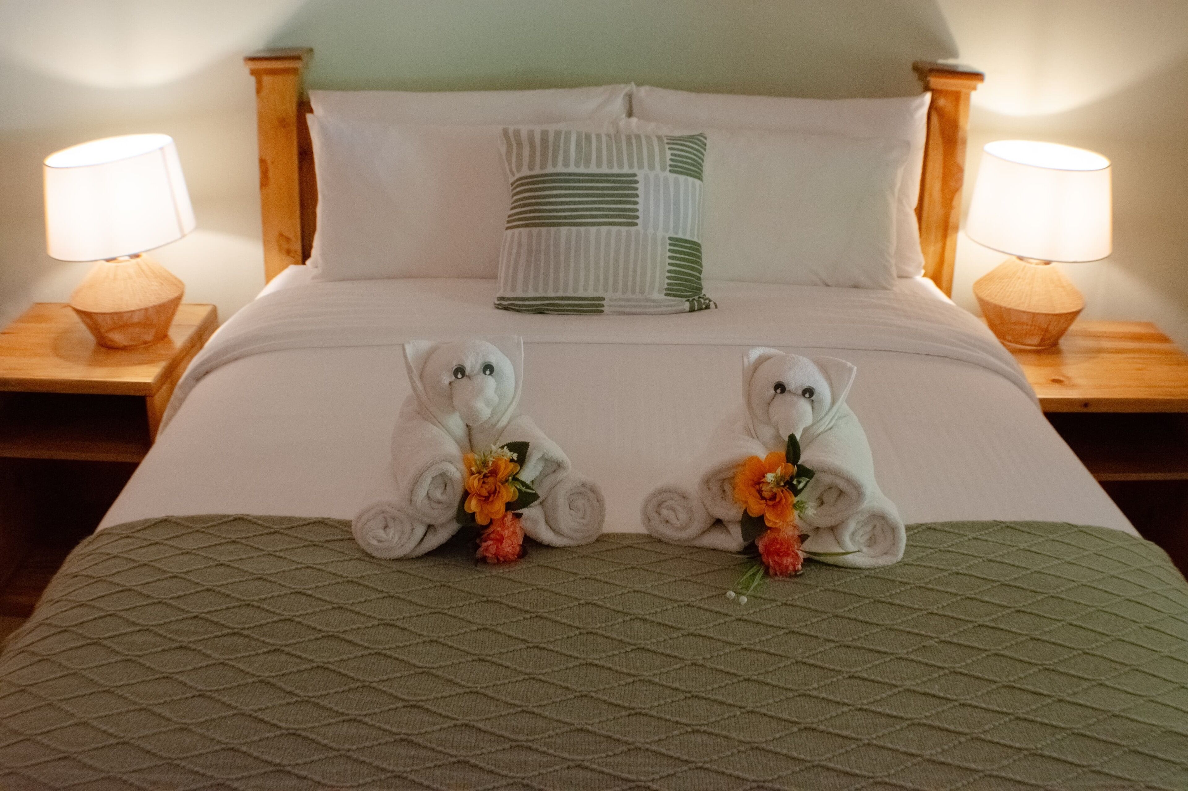 Premium bedding, down comforters, minibar, in-room safe