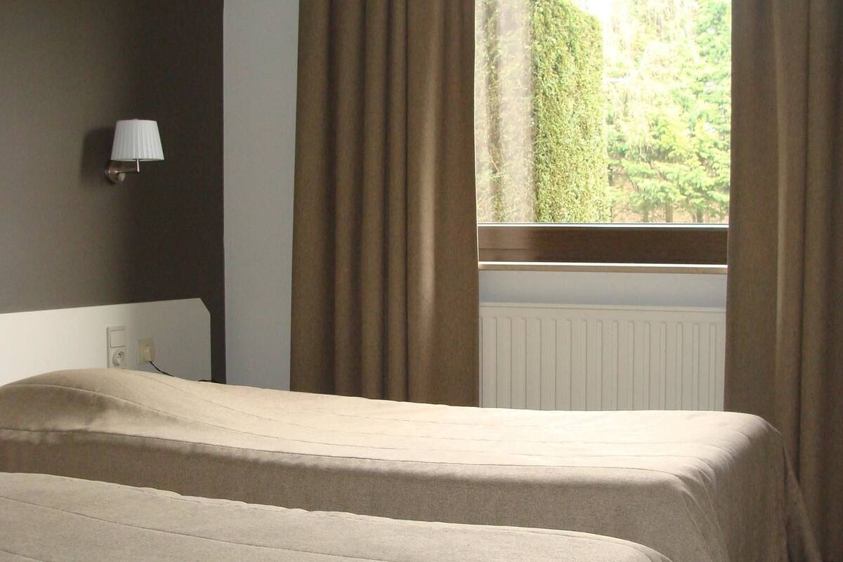 Einzelzimmer | Zimmersafe, Verdunkelungsvorhänge, Babybetten, kostenloses WLAN