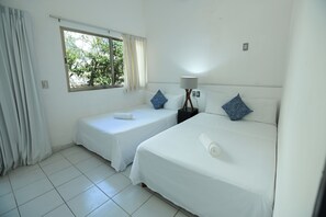 Comfort Room, Patio two double beds | Iron/ironing board, free WiFi, bed sheets