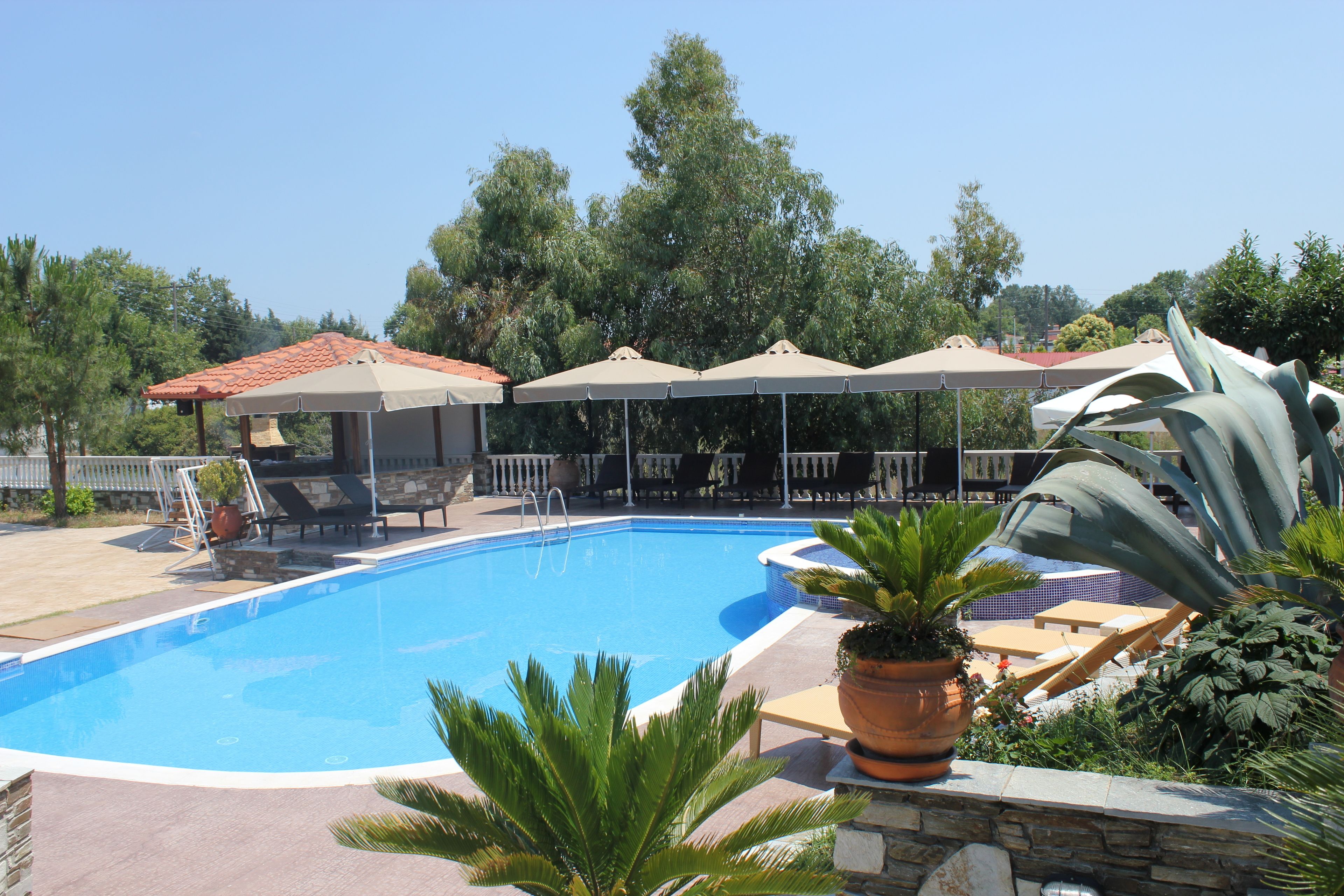 2 outdoor pools, pool umbrellas, pool loungers
