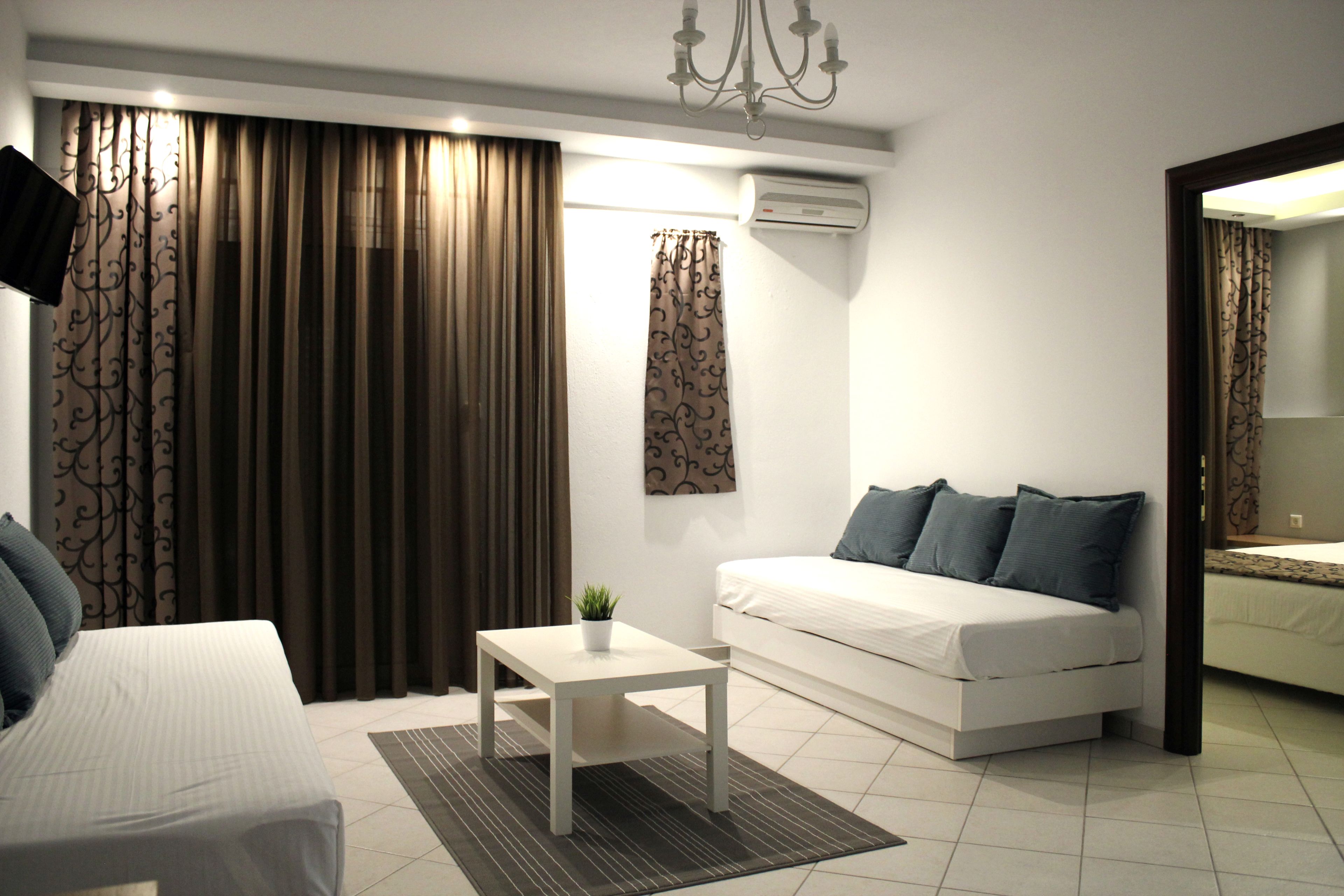 deluxe quadruple room, 2 bedrooms | in-room safe, desk, blackout curtains, soundproofing