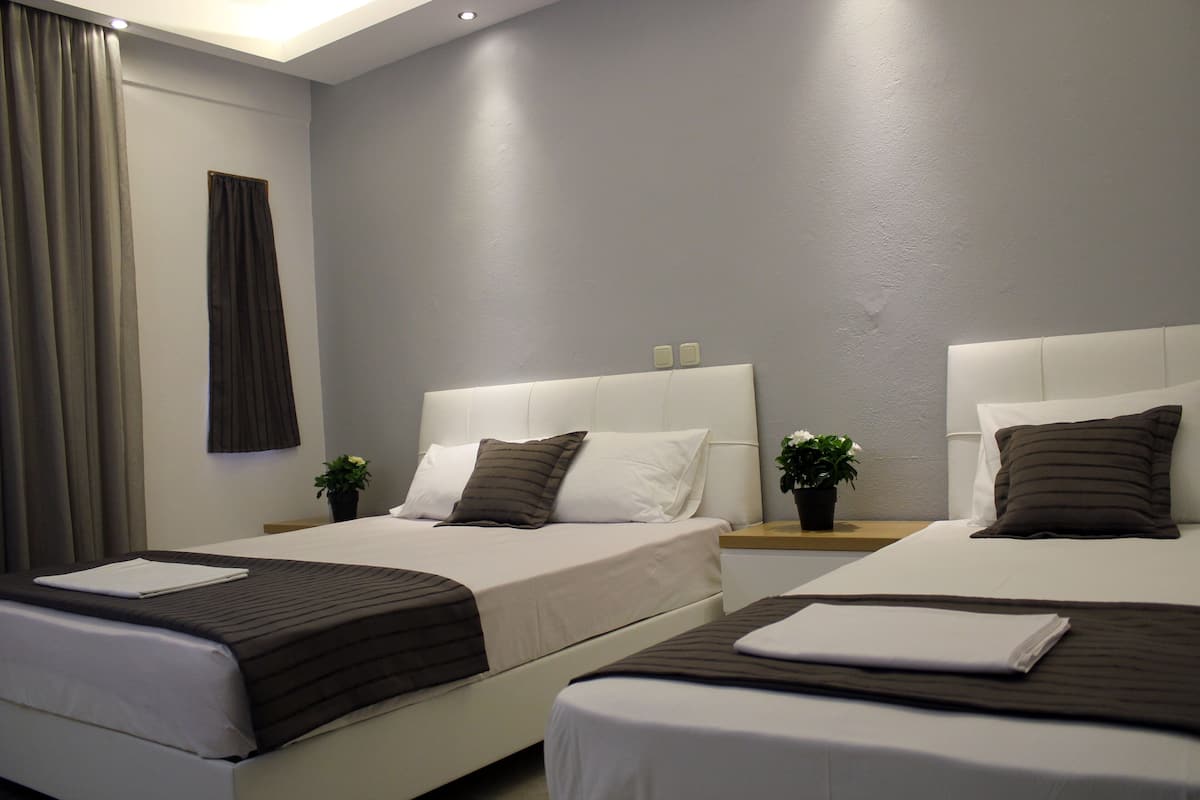 triple room | in-room safe, desk, blackout curtains, soundproofing