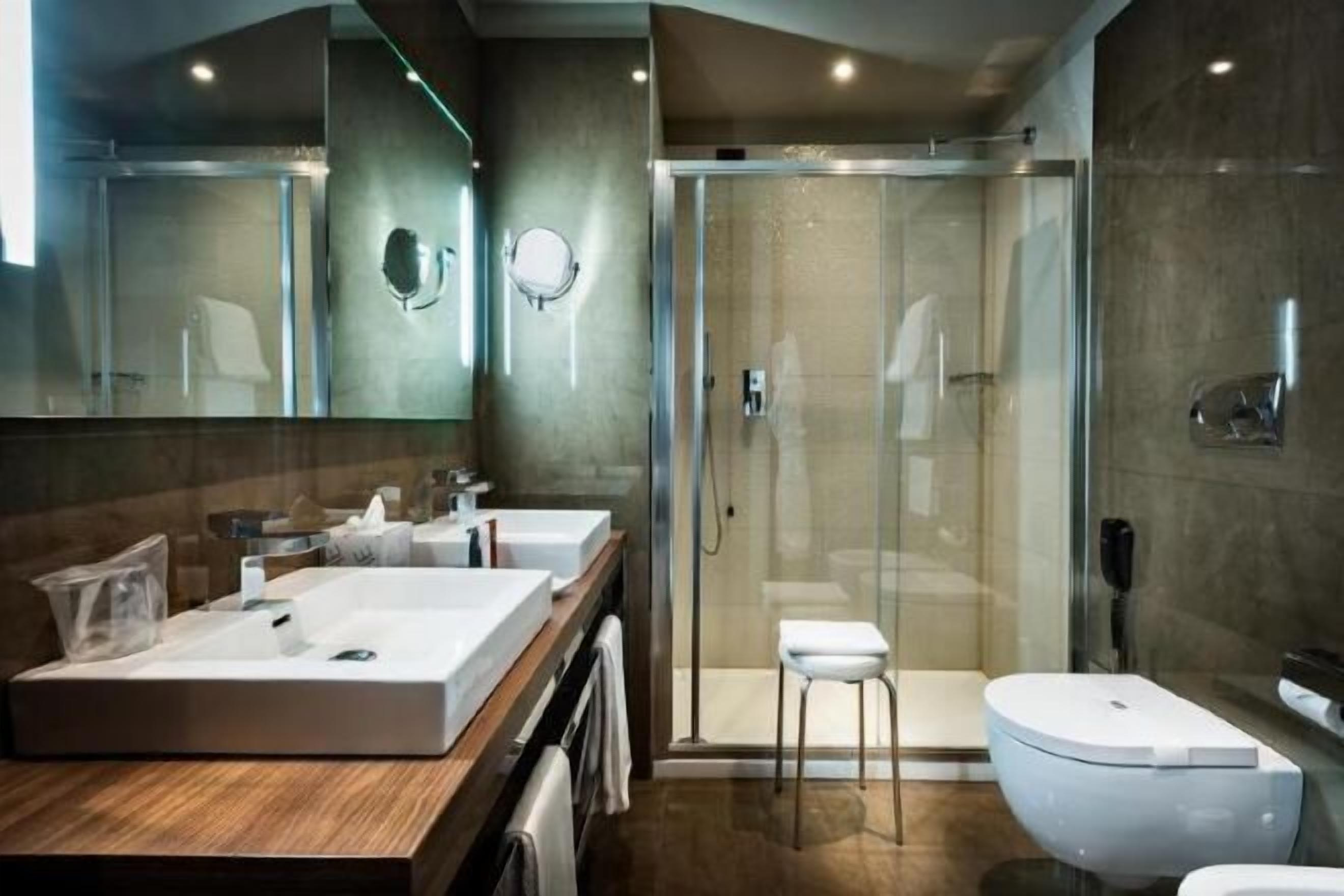 Bathroom | Shower, free toiletries, hair dryer, bathrobes