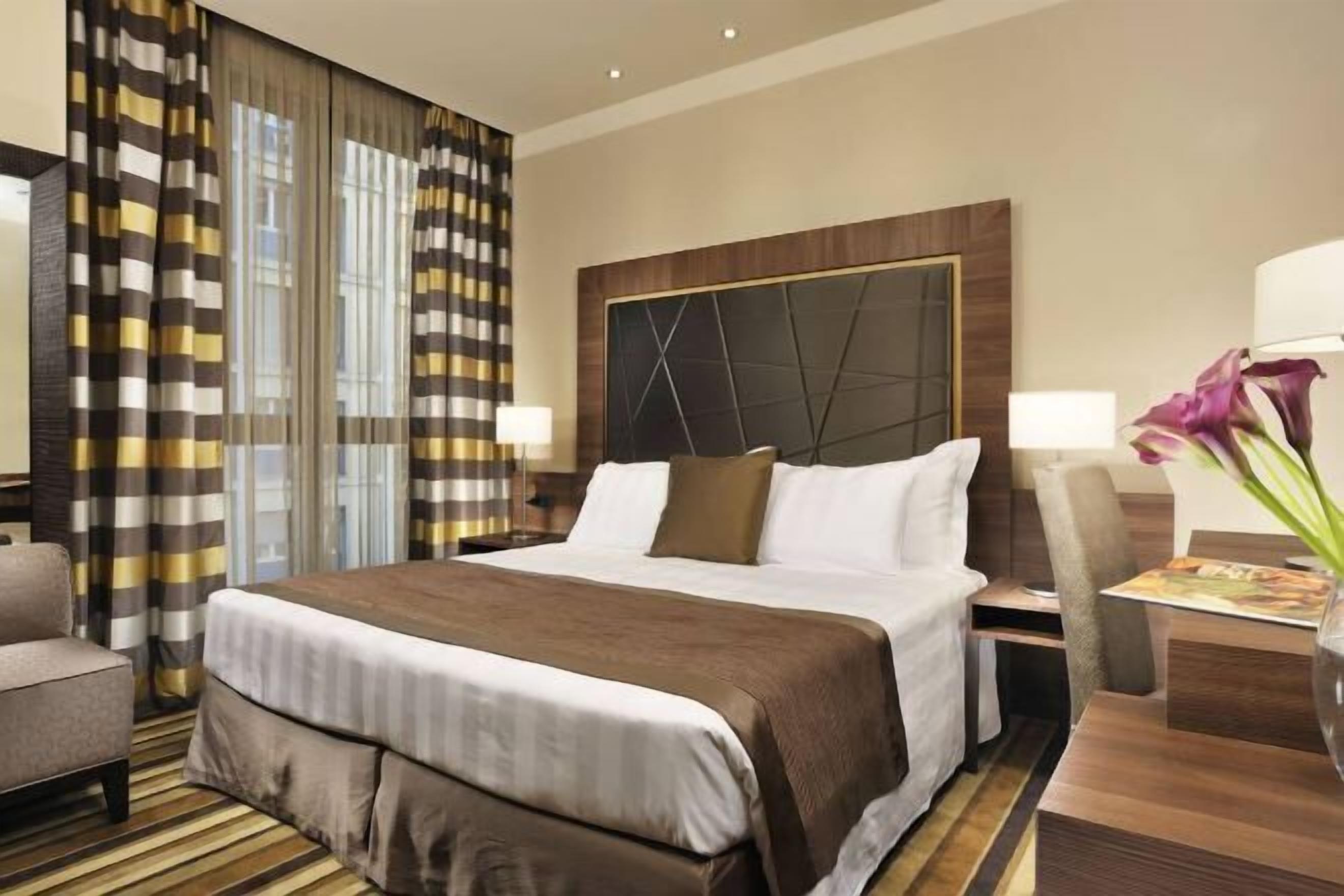 Premium bedding, down comforters, minibar, in-room safe