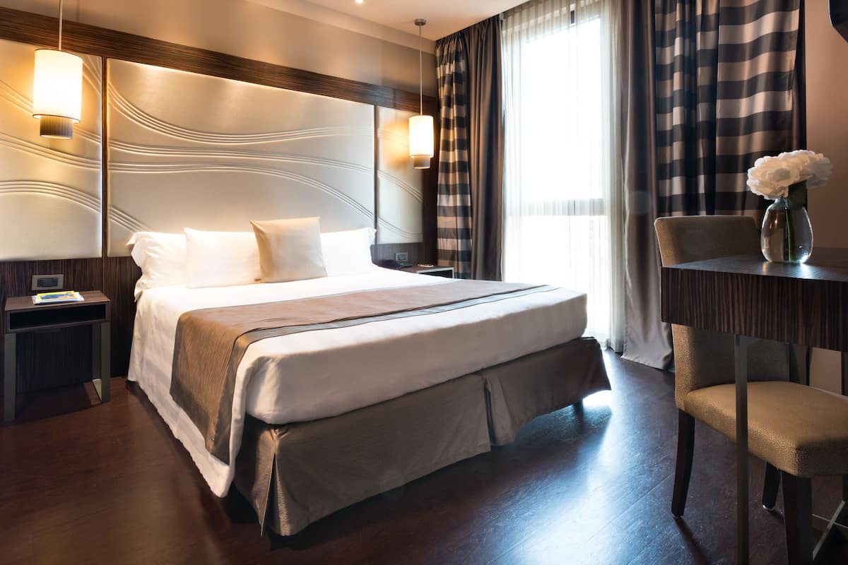 Premium bedding, down duvets, minibar, in-room safe