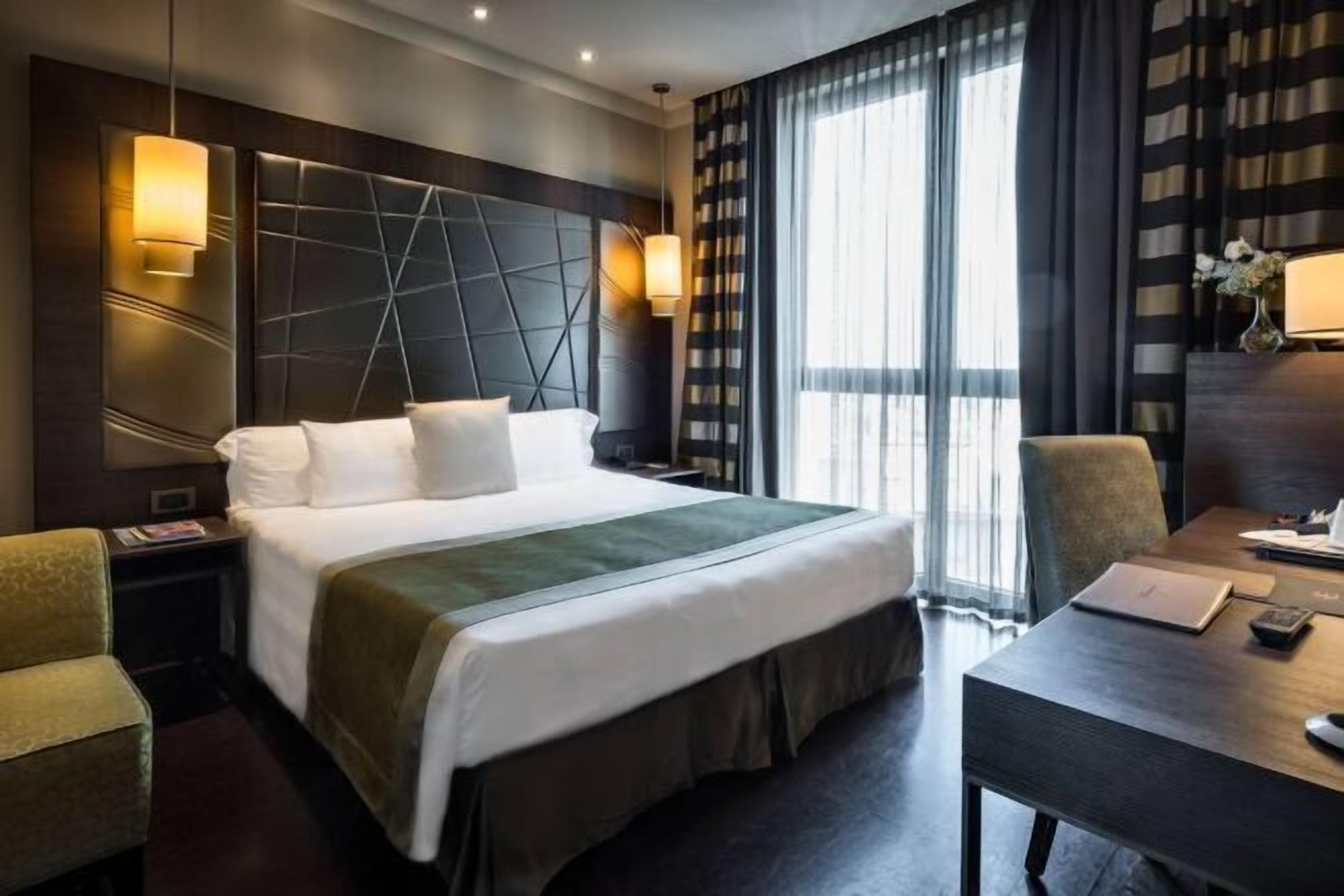 Premium bedding, down comforters, minibar, in-room safe