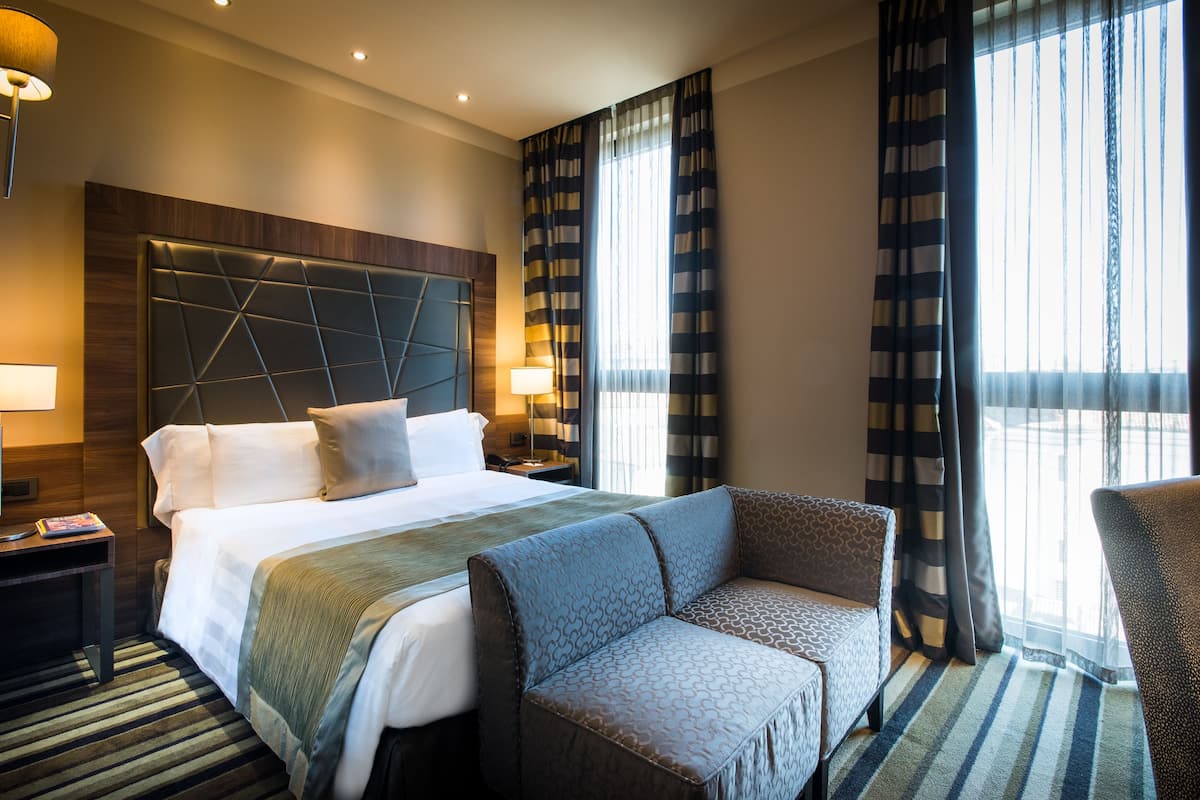 1 habitación, ropa de cama de alta calidad, cubrecamas y minibar