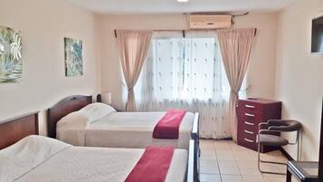 Camera quadrupla | Copriletto in piuma, materassi a doppio strato