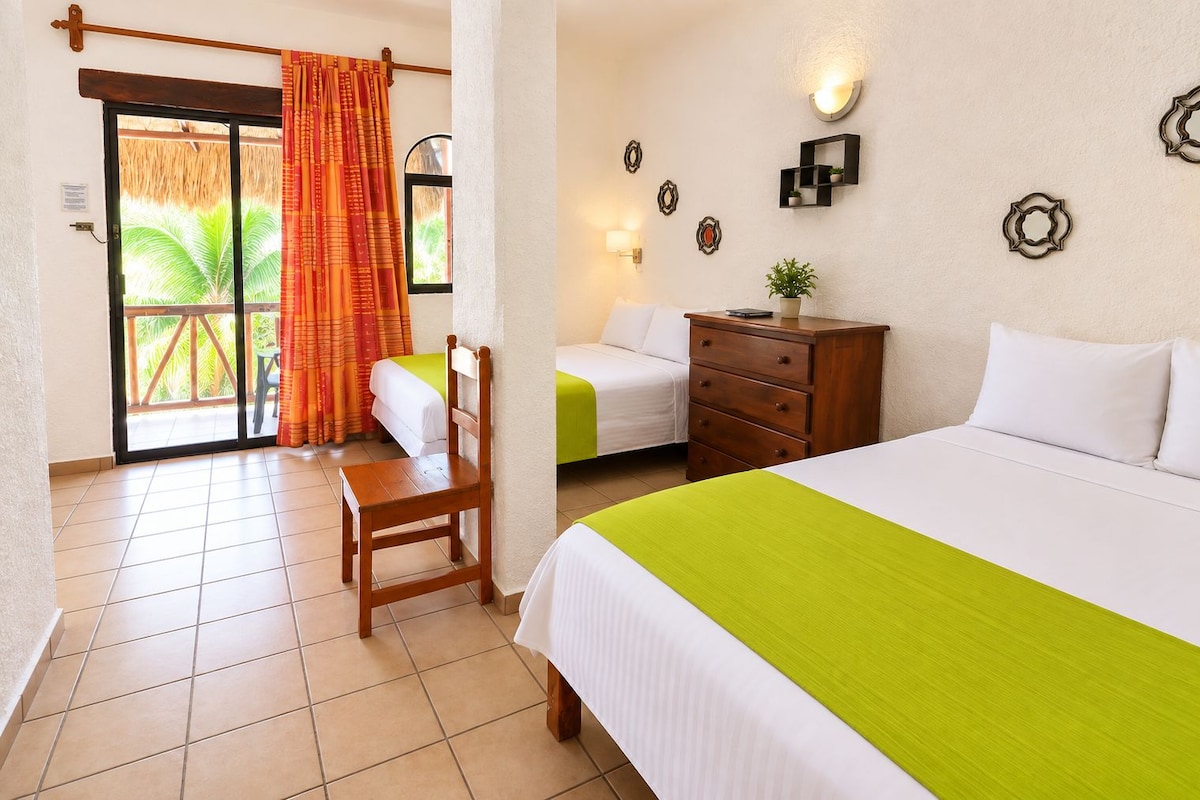 Basic Quadruple Room, Garden View | In-room safe, free WiFi, bed sheets