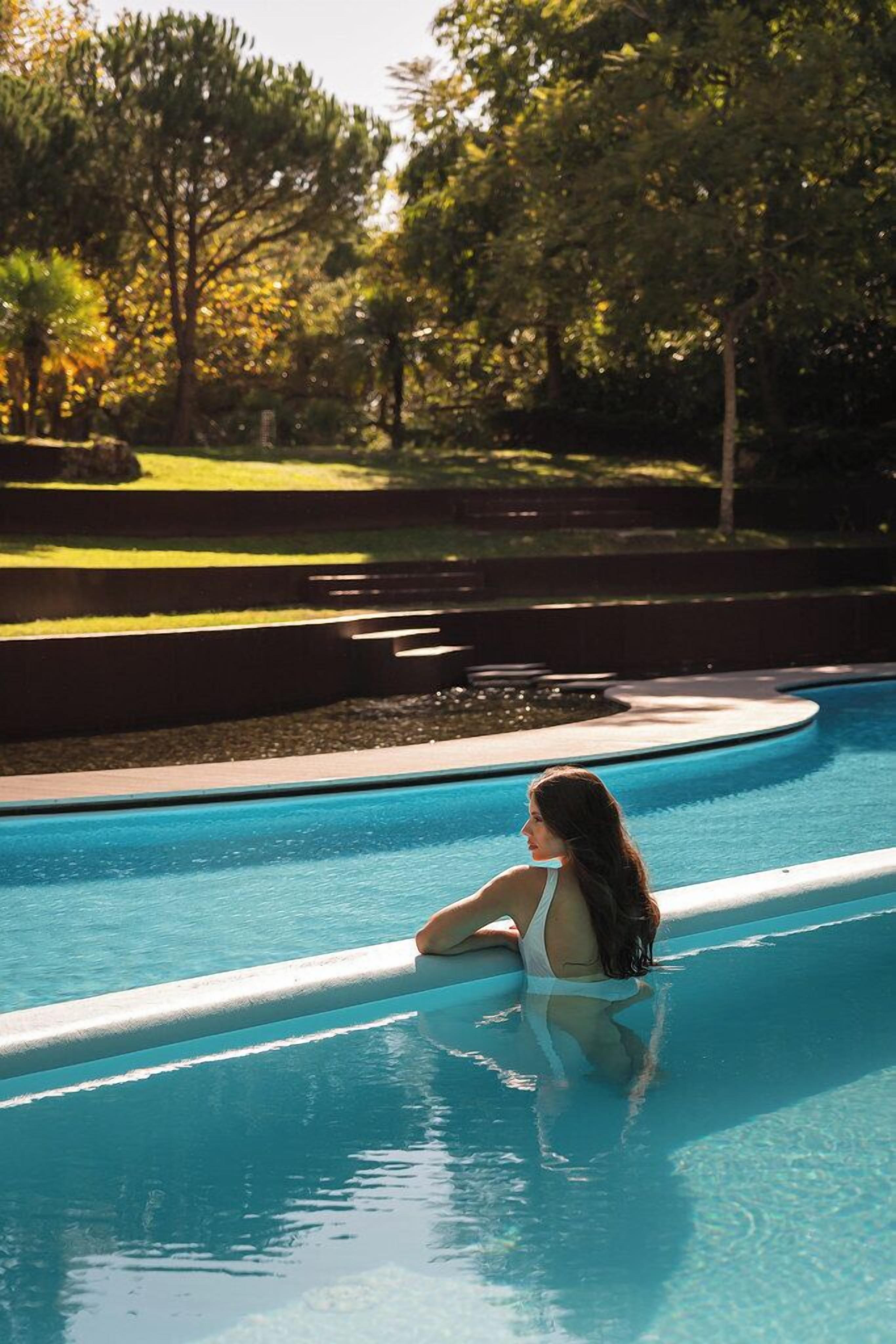 Indoor pool, seasonal outdoor pool, pool umbrellas, pool loungers