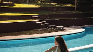 Indoor pool, seasonal outdoor pool, pool umbrellas, pool loungers
