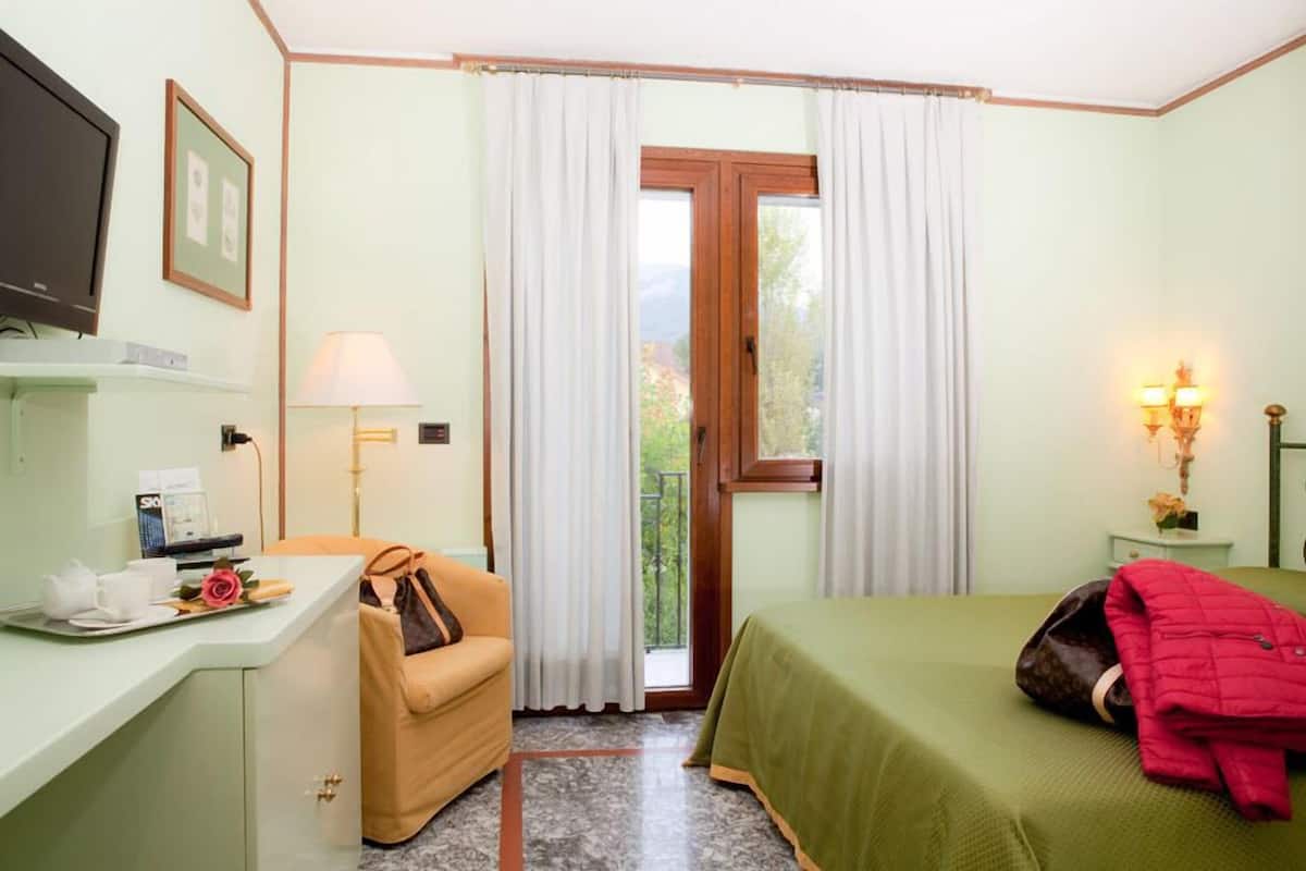 double room | pillow-top beds, minibar, in-room safe, individually decorated