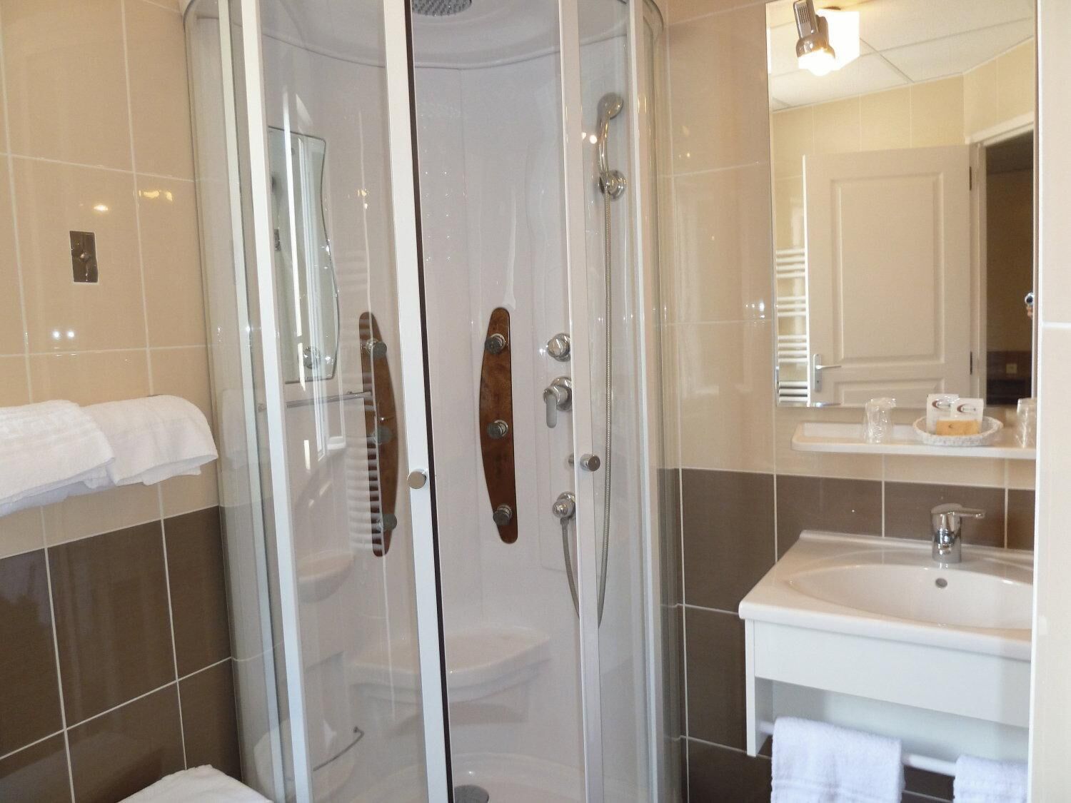 Shower, free toiletries, hair dryer, towels