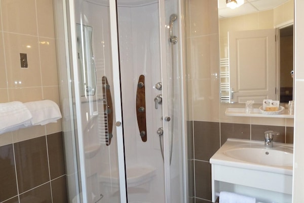Shower, free toiletries, hair dryer, towels