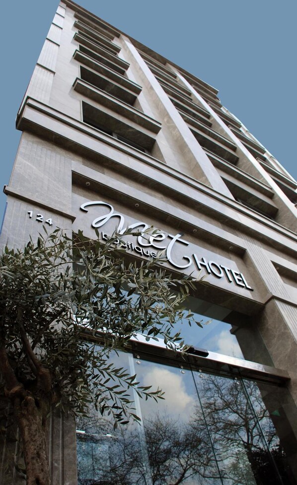A modern hotel building with a prominent sign reading "Meet Boutique Hotel". - Met Boutique Hotel - Boutique Class (Izmir)