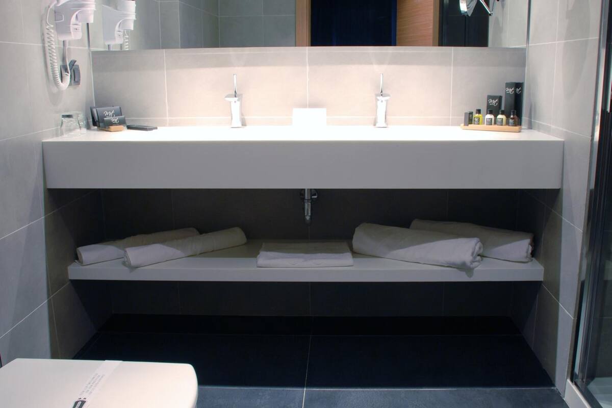 rainfall showerhead, free toiletries, hair dryer, bathrobes