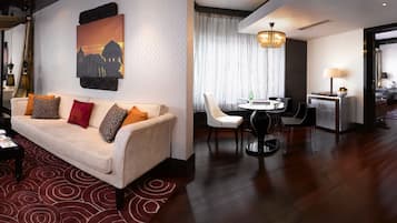 Suite, 1 King Bed (Prestige) | Living area | LCD TV