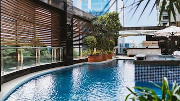 Outdoor pool, open 6:00 AM to 8:00 PM, pool umbrellas, pool loungers