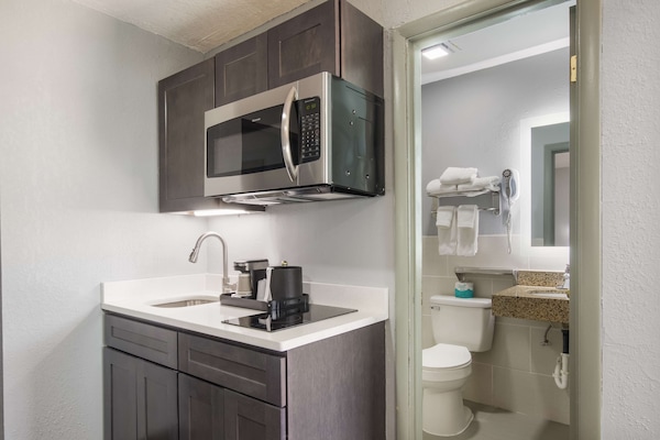 Suite, 2 Double Beds, Pets Not Allowed | Private kitchenette | Fridge, microwave, coffee/tea maker