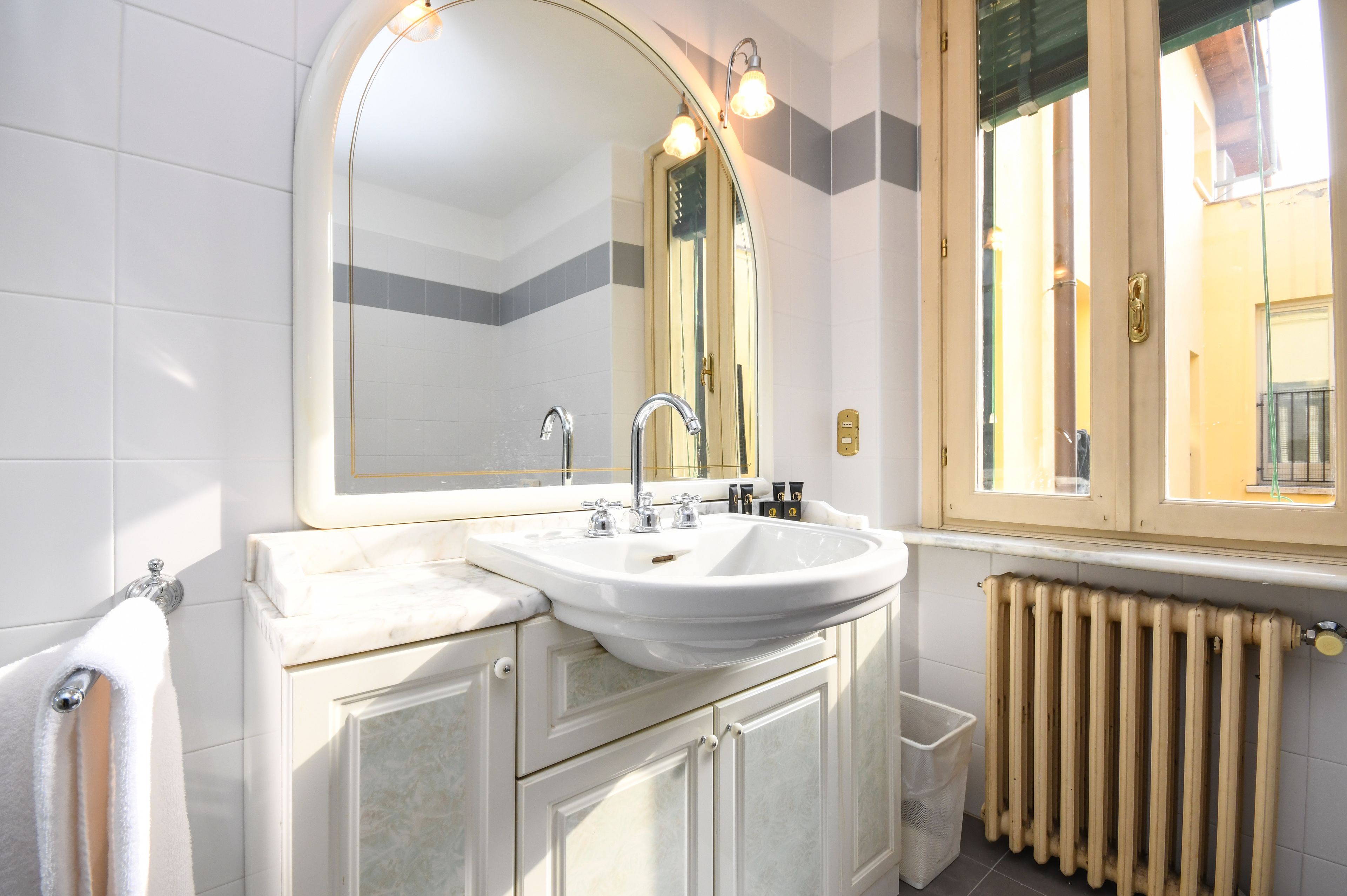 city apartment, 1 bedroom, kitchen, annex building | bathroom | combined shower/bathtub, rainfall showerhead, designer toiletries