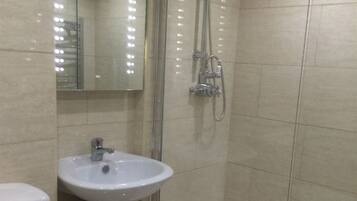 Shower, free toiletries, hair dryer, towels