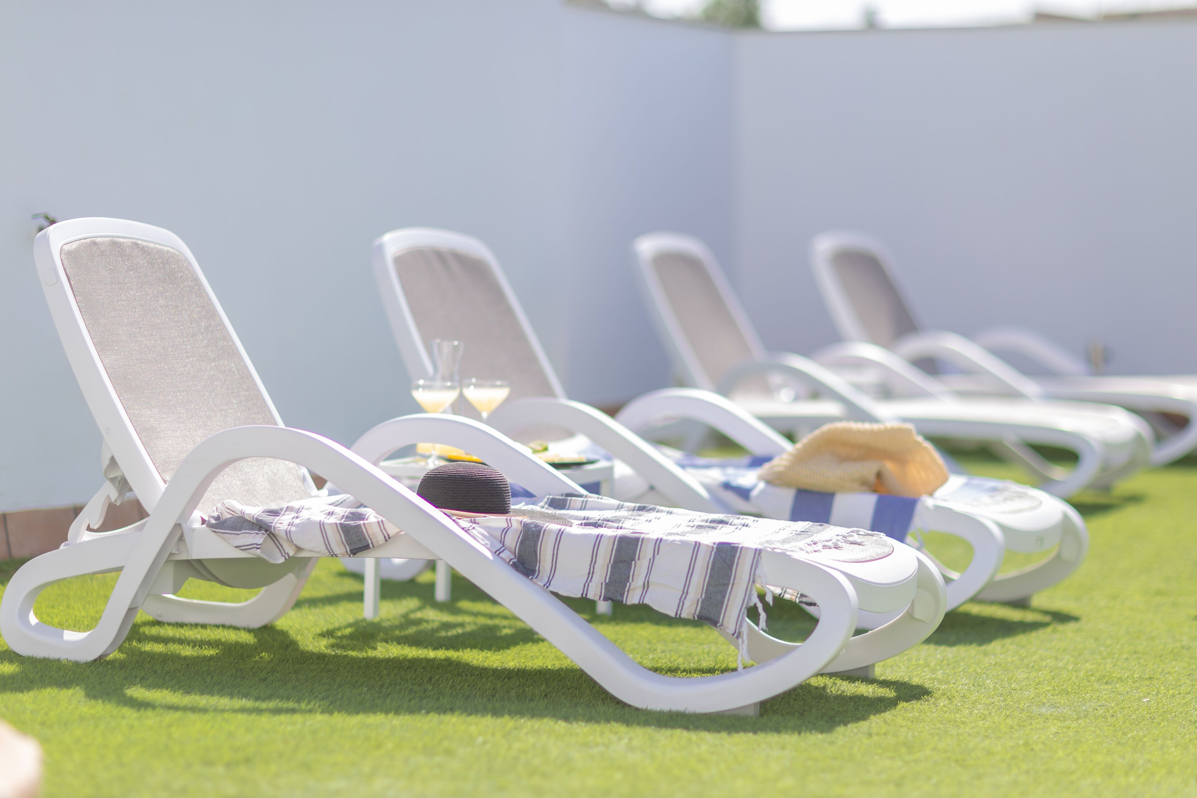 outdoor pool, pool loungers