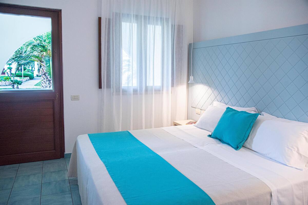 Suíte luxo (Quadrupla) | Frigobar, cofres nos quartos, escrivaninha, Wi-Fi de cortesia