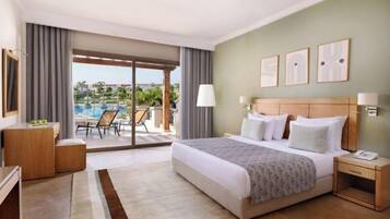 Suite Deluxe | Minibar, coffres-forts dans les chambres, rideaux occultants