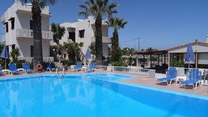Outdoor pool, pool umbrellas, pool loungers