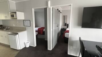 Apartment, 2 Bedrooms | Blackout drapes, iron/ironing board, free WiFi, bed sheets