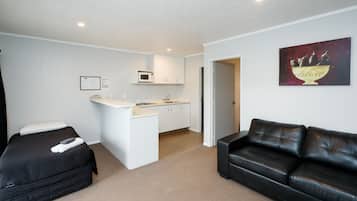 Apartment, 1 Bedroom | Private kitchen | Fridge, microwave, coffee/tea maker, electric kettle