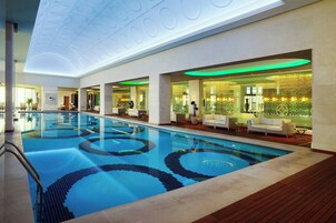 Indoor pool, seasonal outdoor pool, pool umbrellas, sun loungers