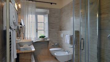 Shower, free toiletries, hair dryer, towels
