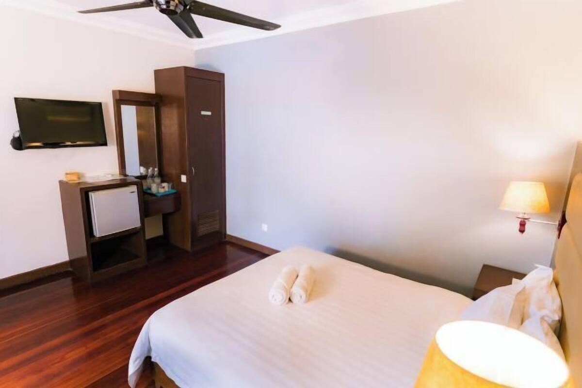 Desk, blackout drapes, iron/ironing board (on request), WiFi (free)