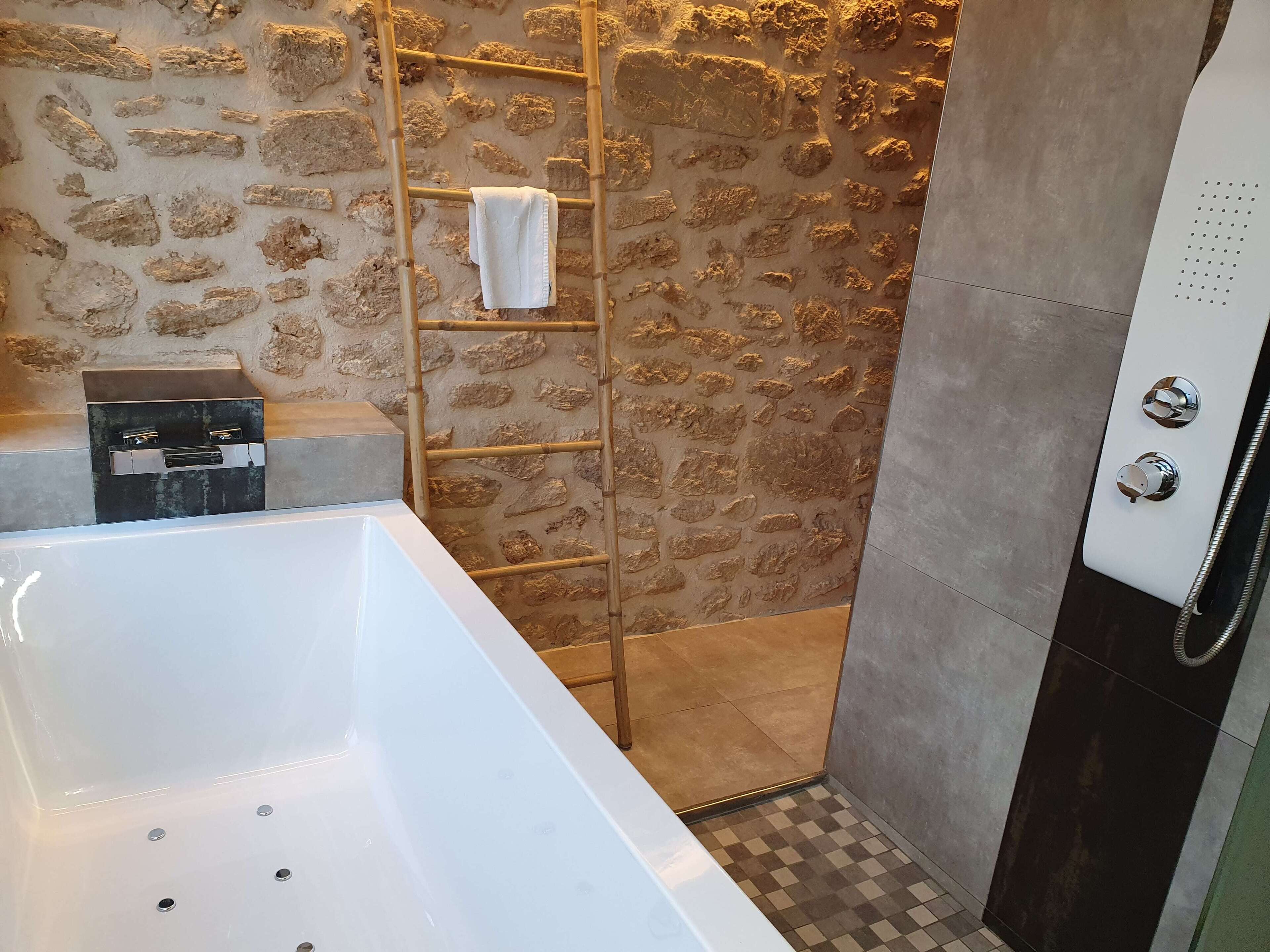 luxury suite, private pool | bathroom | hair dryer, towels