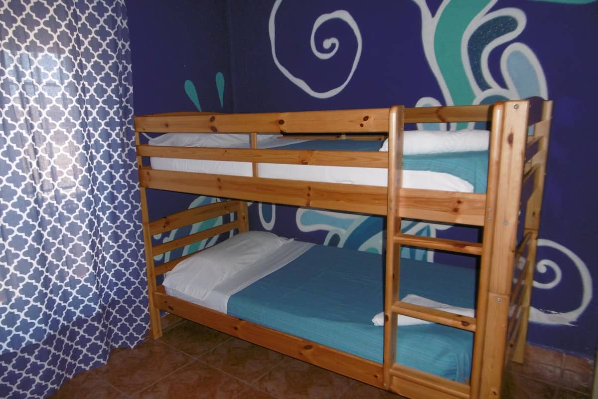 Family Room, Shared Bathroom | Blackout drapes, iron/ironing board (on request), cribs (free)