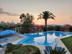 Seasonal outdoor pool, open 9:00 AM to 10:00 PM, pool umbrellas - Argo Apartments (Chania)