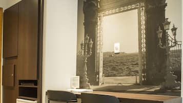 Habitación Deluxe con 1 cama doble o 2 individuales | Minibar, caja fuerte, wifi gratis y ropa de cama